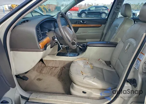 2002 Lincoln Continental z USA, uszkodzony, nr VIN 1LNHM97VX2Y689333